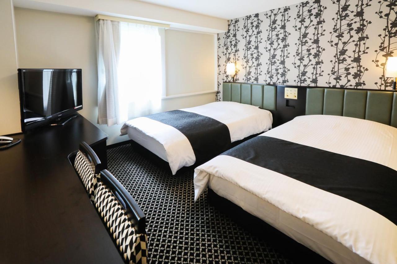 Apa Hotel Sapporo Susukino Ekimae Bagian luar foto
